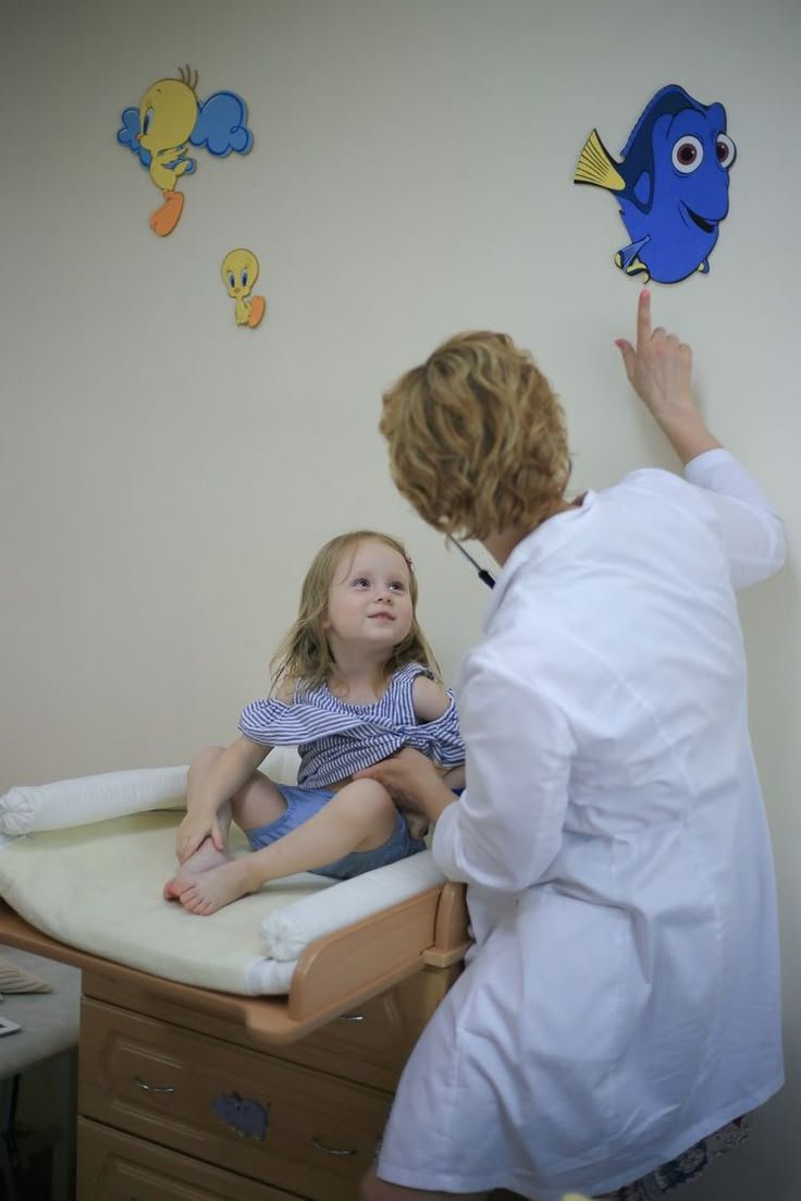 Baby with puzzle pieces around, showing autism and reasons like genes and environment.